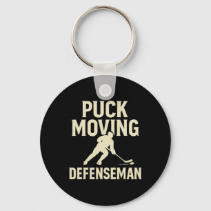 Chaveiro Jogador de hóquei defensivo com puck em movimento