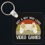Chaveiro Just A Boy Who Loves Video Games<br><div class="desc">Just A Boy Who Loves Video Games. This funny gamer accessory is a great gift for a man, boy, teens & kids who love playing video games & computer games. If you're a geek and love console games & computer gaming, this design is for you! Includes a graphic of a...</div>