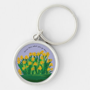 Chaveiro Key Chain diz, "Cresça no que você passa."