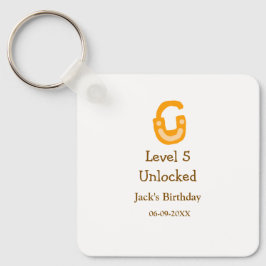 Chaveiro Level 5 unlocked lock orange brown happy birthday 