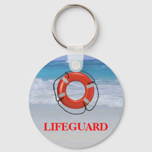 CHAVEIRO LIFESAVER ALARANJADO NA PRAIA