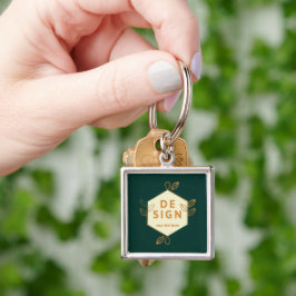 Chaveiro logotipo hexagonal creme decorativo em um verde es