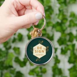 Chaveiro logotipo hexagonal creme decorativo em um verde es