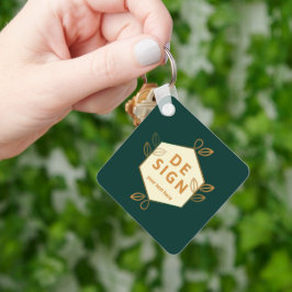 Chaveiro logotipo hexagonal de creme decorativo em um verde