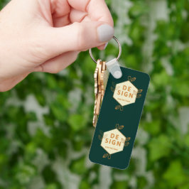 Chaveiro logotipo hexagonal de creme decorativo em um verde