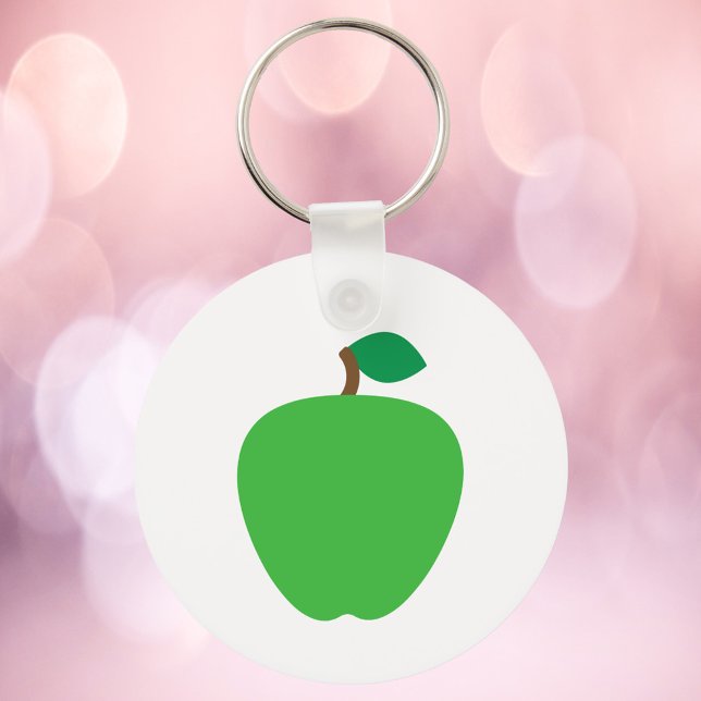 Chaveiro Maçã Verde com Folha (A key chain with a graphic of a green apple)