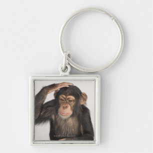Chaveiro Macaco que risca sua cabeça