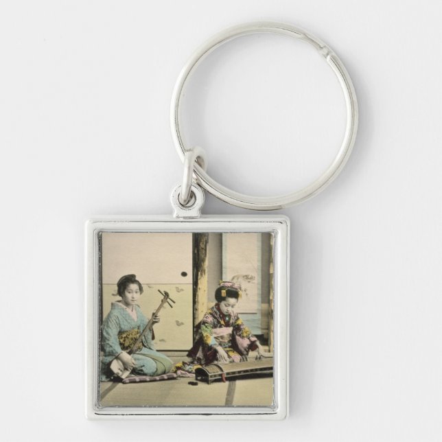 Chaveiro Meninas japonesas que jogam a flauta, o "koto" e (Frente)