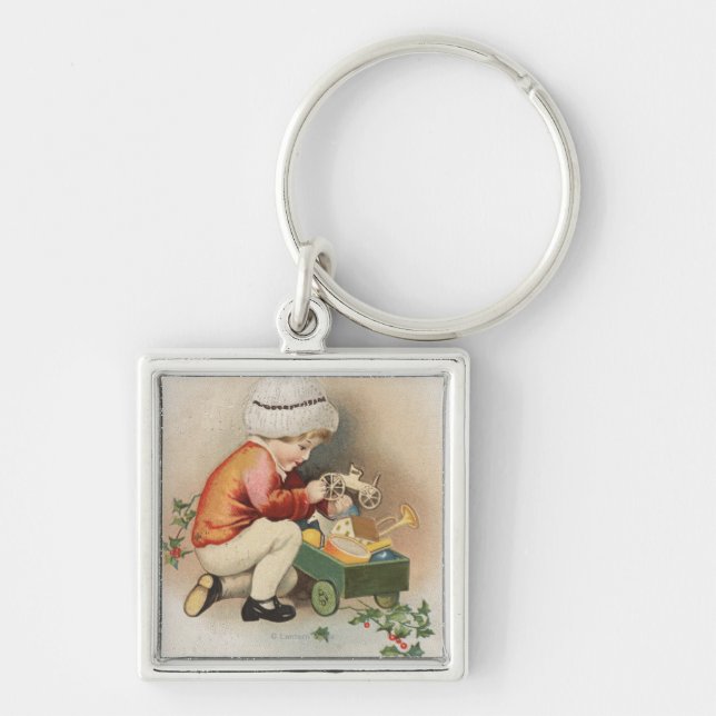 Chaveiro Meu WishKid de Natal Observando Brinquedos (Frente)