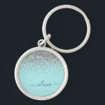 Chaveiro Monograma Brilho Prata Azul Água Teal<br><div class="desc">Pulseiras de Nome Monograma em Script com Brilho Teal e Prata - Azul Água (Pulseira). Isto faz o presente perfeito para o aniversário de 16 anos, casamento, chá de noiva, aniversário de casamento, chá de bebê ou festa de despedida de solteira para alguém que ama luxo e estilos chiques e...</div>