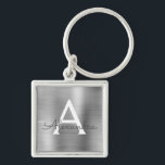 Chaveiro Monograma de Luxo em Prata Aço Inox Falso<br><div class="desc">Corrente de Chaves de Luxo em Prata Aço Inox Falso Metálico Elegante. Essas correntes de chaves podem ser personalizadas para incluir sua inicial e primeiro nome. Essas correntes de chaves fazem ótimos presentes de aniversário,  chá de noiva ou despedida de solteira.</div>