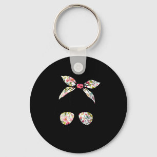 Chaveiro Mulher de coque desarrumado com flores, vida de mã