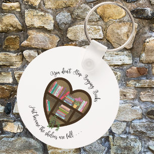 Chaveiro "Não pare de comprar livros." . ."