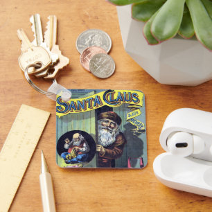 Chaveiro Natais vintages, Papai Noel e seu Livro de Trabalh