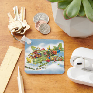 Chaveiro Natais vintages, Papai Noel Voando um Avião