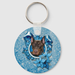 Chaveiro Natal - floco de neve azul - Doberman - rochoso