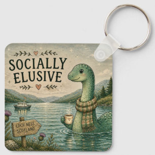 Chaveiro Nessie Esquiva Socialmente Críptico Aconchegante L