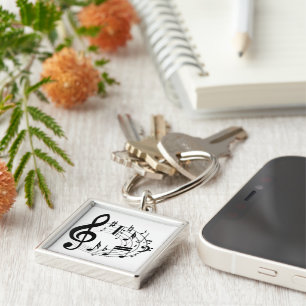 Chaveiro Notas musicais pretas na forma oval