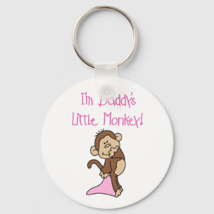 Chaveiro O macaco pequeno do pai cor-de-rosa