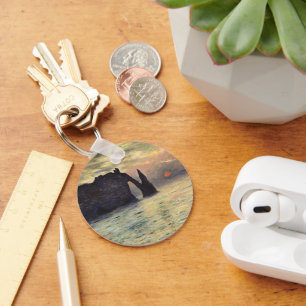 Chaveiro O Penhasco de Étretat, Pôr do Sol por Claude Monet