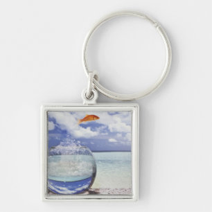 Chaveiro Os peixes que saltam do aquário