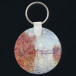 Chaveiro Outono em argentino por Claude Monet<br><div class="desc">Outono na Argentina (1873) de Claude Monet é uma pintura impressionista de arte natural que apresenta o rio Sena com árvores em cores de outono e argentino à distância. Sobre o artista: Claude Monet (1840-1926) foi o fundador do movimento de pintura impressionista francês, com a maioria de suas pinturas no...</div>