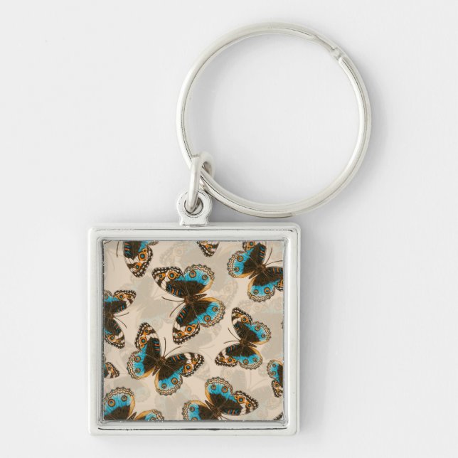 Chaveiro Padrão de Borboleta Azul Pansível em branco (Frente)