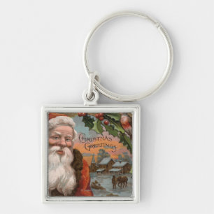 Chaveiro Papai noel com azevinho, cena da vila
