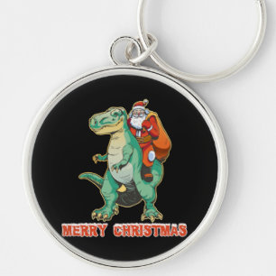 Chaveiro Papai Noel montando dinossauro