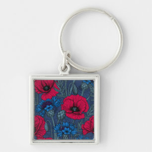 Chaveiro Papoilas vermelhas e flores azuis em azul
