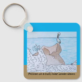 Chaveiro Pelicano numa rocha perto das ondas do oceano