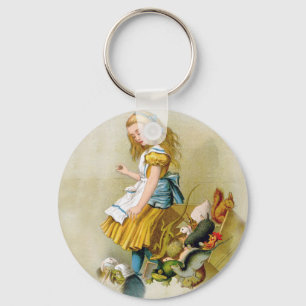 Chaveiro Pontas de Alice sobre a caixa de júri no valete