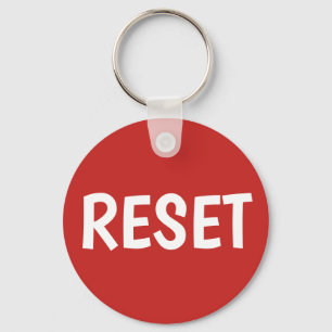 Chaveiro Pressione o botão Reset (Redefinir)