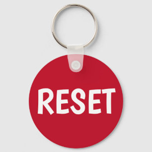 Chaveiro Pressione o botão Reset (Redefinir)