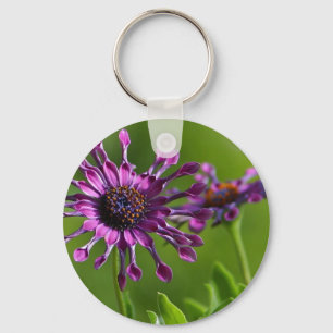 Chaveiro pulseira de flores roxas