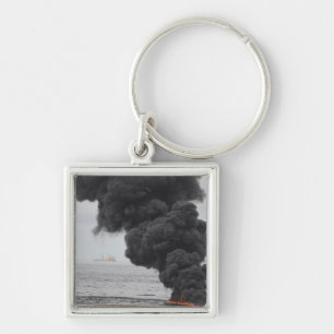 Chaveiro Queimaduras de óleo concentrado coletadas