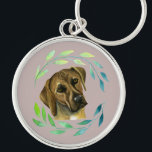 Chaveiro Rhodesian Ridgeback com uma aguarela da grinalda<br><div class="desc">Esta é uma pintura da aguarela de um cão de Rhodesian Ridgeback. Tem uma grinalda verde em torno de sua cara.</div>