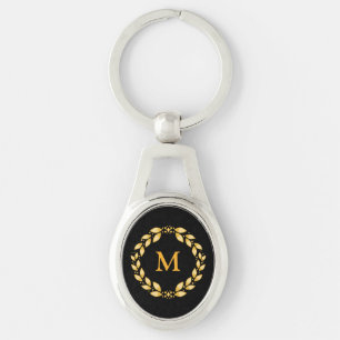Chaveiro romano com folhas dourado ornamentado do