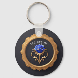 Chaveiro Rosa Azul Elegante em Moldura Dourada com Detalhes