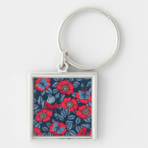 Chaveiro Rosa de cão e borboletas em azul e vermelho