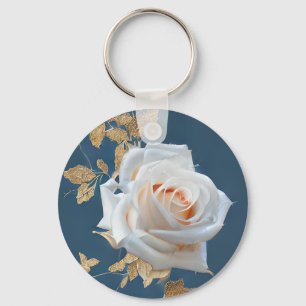 Chaveiro Rosas brancas e folhas de ouro sobre fundo azul