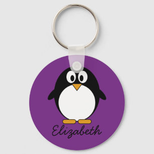 Chaveiro roxo bonito do pinguim dos desenhos animados