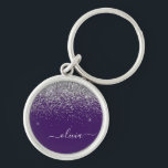 Chaveiro Roxo Silver Glitter Girly Glam Monograma<br><div class="desc">Chaveiros com nomes de Monograma de Script Glitter de Silver e Purple Sparkle (Cadeia de Chaves). Isto faz o doce e perfeito aniversário de 16 anos,  casamento,  chá de panela,  aniversário,  chá de fraldas ou festa de solteira presente para alguém que ama luxo de luxo e estilos quíticos.</div>
