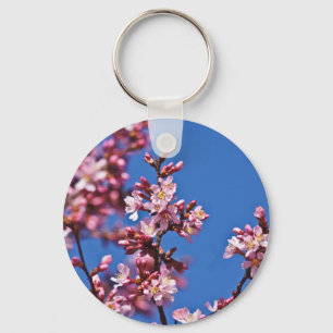 Chaveiro Sakura Cherry Blossoms tocando azul