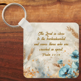 Chaveiro Salmo 34:18 O Senhor está perto de uma Bíblia de c