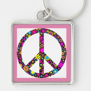 CHAVEIRO SINAL DE PAZ FLORAL DE GROOVY