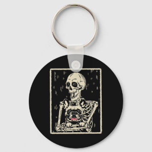 Chaveiro Skeleton abraça o cão-grande francês