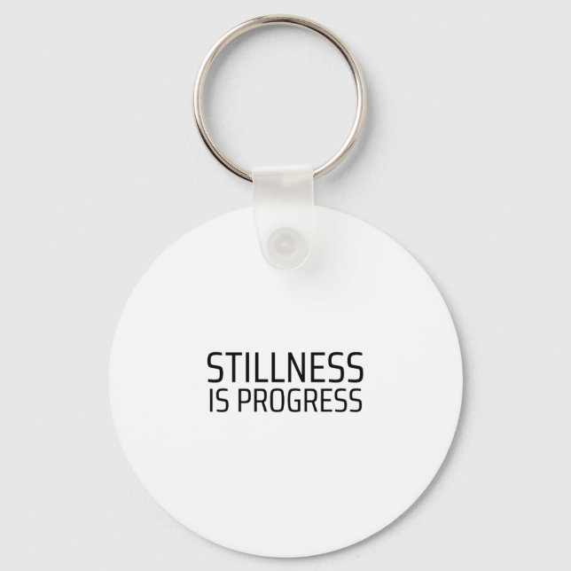 Chaveiro Stillness Is Progress Minimalist Typewriter (Frente)