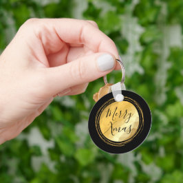 Chaveiro texto de Natal alegre metálico preto e dourado
