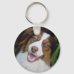 Chaveiro Tri Aussie vermelho de sorriso